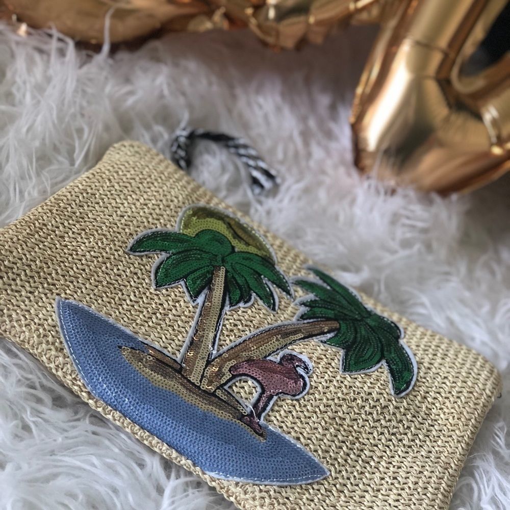 Straw clutch with sequin embroidery